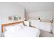 Spacious bedroom with built-in storage, soft lighting, and stylish decor at 616 Dorothea Dr, Raleigh, NC 27603