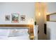 Comfortable bedroom with a padded headboard and soft lighting offers a calm, inviting space at 616 Dorothea Dr, Raleigh, NC 27603