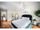 Main bedroom with private entrance, hardwood floors, and ensuite bathroom at 616 Dorothea Dr, Raleigh, NC 27603
