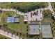 Aerial view of community tennis and basketball courts surrounded by sidewalks and landscape at 638 Boulder Point Dr, Chapel Hill, NC 27516