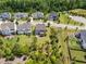 Aerial view of homes nestled in a community with beautiful landscaping, showcasing neighborhood layout at 638 Boulder Point Dr, Chapel Hill, NC 27516