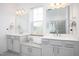 Bright bathroom with double vanity, a large window, and storage offers a functional and stylish space at 638 Boulder Point Dr, Chapel Hill, NC 27516