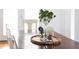 Close up of dining table featuring decorative flowers on a wooden table at 638 Boulder Point Dr, Chapel Hill, NC 27516