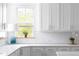 Modern kitchen with sleek countertops and ample cabinet space at 638 Boulder Point Dr, Chapel Hill, NC 27516