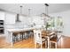 Open-concept kitchen with stainless steel appliances and white cabinetry at 638 Boulder Point Dr, Chapel Hill, NC 27516