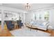 Open concept living room with view into kitchen and dining areas at 638 Boulder Point Dr, Chapel Hill, NC 27516