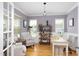 Bright home office with built-in shelving, desk, and ample natural light at 638 Boulder Point Dr, Chapel Hill, NC 27516