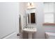 Powder room featuring pedestal sink, framed mirror, and neutral wall color providing a fresh and clean space at 638 Boulder Point Dr, Chapel Hill, NC 27516