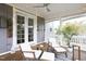 Inviting screened porch with seating, ceiling fan, and natural light perfect for relaxing outdoors at 638 Boulder Point Dr, Chapel Hill, NC 27516