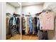 Walk-in closet with clothing racks and shelving providing ample storage space for any resident at 638 Boulder Point Dr, Chapel Hill, NC 27516