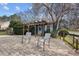 Relaxing backyard setting with a wood deck, pergola and lush landscaping, offering privacy at 754 Epps Clark Rd, Siler City, NC 27344