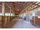 Wide barn interior with stalls along the sides at 754 Epps Clark Rd, Siler City, NC 27344
