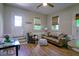 Cozy living room features beautiful floors, comfortable seating, and natural light, creating an inviting atmosphere at 754 Epps Clark Rd, Siler City, NC 27344