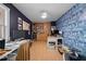 This home office has built in shelving, work desks, and bright wall paper at 754 Epps Clark Rd, Siler City, NC 27344