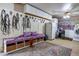 Functional tack room equipped with storage, seating, and convenient amenities for equestrian gear, and cleaning area at 754 Epps Clark Rd, Siler City, NC 27344