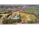 Aerial view of two properties with acreage outlined in red and yellow on a wooded lot at 754 Epps Clark Rd, Siler City, NC 27344