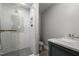 Well-lit bathroom featuring stylish gray finishes and a stand-up shower at 754 Epps Clark Rd, Siler City, NC 27344