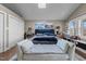 Bright bedroom features vaulted ceiling, skylight, sitting area, and neutral paint at 754 Epps Clark Rd, Siler City, NC 27344