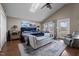 Spacious bedroom features vaulted ceiling, skylight, sitting area, and private balcony at 754 Epps Clark Rd, Siler City, NC 27344