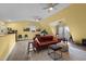 Bright, spacious bonus room with a comfortable sofa, natural light, and ample room for activities at 754 Epps Clark Rd, Siler City, NC 27344