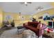 Inviting bonus room features comfortable seating, ample natural light, and versatile living space at 754 Epps Clark Rd, Siler City, NC 27344