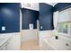Well-lit bathroom featuring a soaking tub and separate shower with a neutral color scheme at 8300 Neuse Hunter Dr, Raleigh, NC 27616