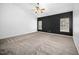 Spacious bedroom featuring a ceiling fan and two windows with natural light at 8300 Neuse Hunter Dr, Raleigh, NC 27616