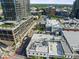 An elevated view highlighting the building, its surroundings and the nearby high-rise buildings and city at 101 Morris St # D, Durham, NC 27701