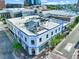 Street-level view of charming building with rooftop terrace in a vibrant neighborhood at 101 Morris St # D, Durham, NC 27701