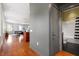 Modern living area with hardwood floors leads to an updated bathroom at 101 Morris St # D, Durham, NC 27701