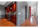 Contemporary kitchen featuring wood cabinets, stainless steel appliances, and breakfast bar at 101 Morris St # D, Durham, NC 27701