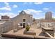 Rooftop deck boasting city views, featuring modern outdoor furniture and a relaxed atmosphere at 101 Morris St # D, Durham, NC 27701