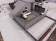 A stylish rooftop deck featuring modern furniture, creating an inviting outdoor lounge area with open views at 101 Morris St # D, Durham, NC 27701