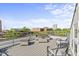 Relaxing rooftop deck with stylish outdoor furniture, perfect for enjoying city views at 101 Morris St # D, Durham, NC 27701