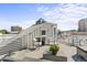Stylish rooftop deck with outdoor seating, offering stunning views of the city at 101 Morris St # D, Durham, NC 27701