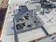 Birds-eye view of the relaxing rooftop deck featuring stylish outdoor furniture at 101 Morris St # D, Durham, NC 27701