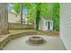 Backyard features a fire pit area and lush greenery at 105 Parkmount Cir, Cary, NC 27519