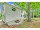 Backyard featuring a fire pit area, lush greenery, and patio at 105 Parkmount Cir, Cary, NC 27519