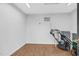 Basement with wood flooring and white walls, offering a clean and versatile storage space at 105 Parkmount Cir, Cary, NC 27519