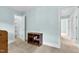 Bright bedroom features neutral carpet, and multiple doors to other rooms at 105 Parkmount Cir, Cary, NC 27519