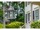 Close up view of a vintage lamp post in the front yard with house number in background at 105 Parkmount Cir, Cary, NC 27519