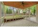 Comfortable screened porch with backyard views and wooden flooring at 105 Parkmount Cir, Cary, NC 27519
