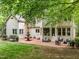 Large backyard with patio, fountain, and outdoor seating offering a private oasis at 106 Birkhaven Dr, Cary, NC 27518
