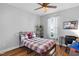 Bedroom featuring hardwood floors and natural light at 106 Jj Dr, Benson, NC 27504