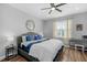 Comfortable bedroom with ample natural light and hardwood floors at 106 Jj Dr, Benson, NC 27504