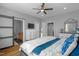 Cozy bedroom with hardwood floors and access to the bathroom at 106 Jj Dr, Benson, NC 27504