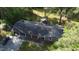 Aerial view of the home showcasing the roof, covered parking, and well-maintained yard at 109 Edgewood Dr, Louisburg, NC 27549