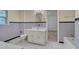 Bathroom with retro-style tile, single sink vanity, toilet, and bathtub at 1105 Hargrove St, Henderson, NC 27536