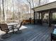 Spacious wooden deck, perfect for outdoor dining and entertaining with mature trees at 1108 Kalworth Rd, Wake Forest, NC 27587