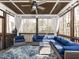 Relaxing screened porch with wood ceiling, comfortable seating, and views of the backyard at 1108 Kalworth Rd, Wake Forest, NC 27587